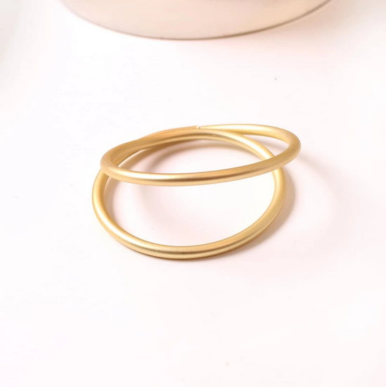 Rond de serviette double anneaux dorés métal E&C Events location matériel décoration mariage anniversaire événement Pays de Gex Geneve